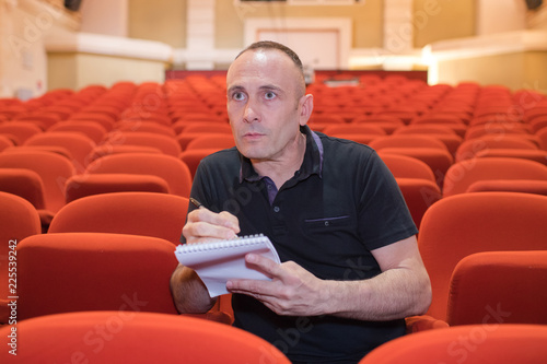 theatre director writing notes notes photo