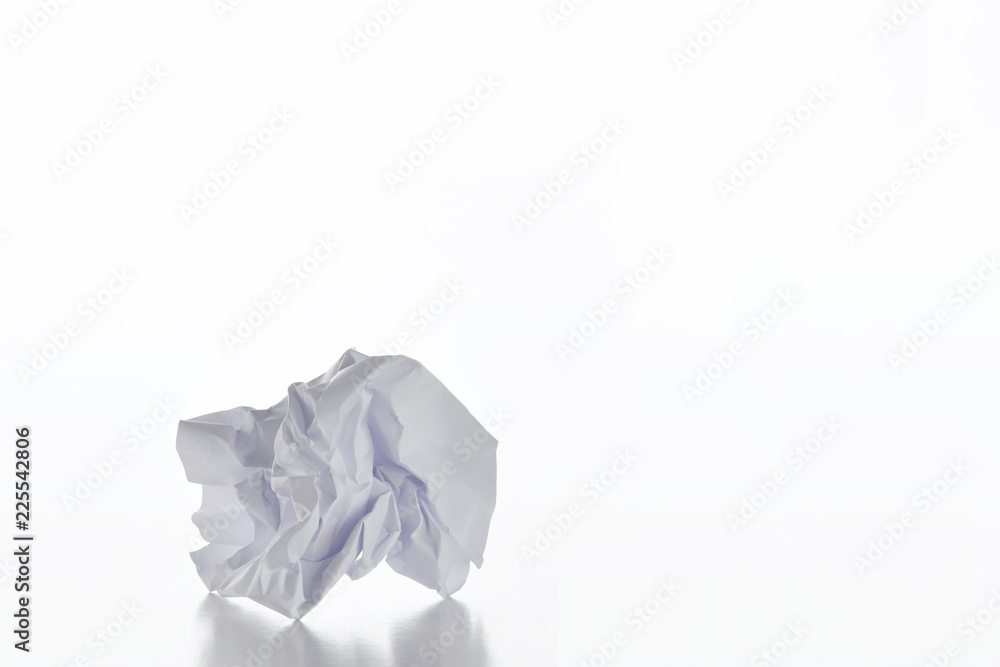 White crumpled paper on white background