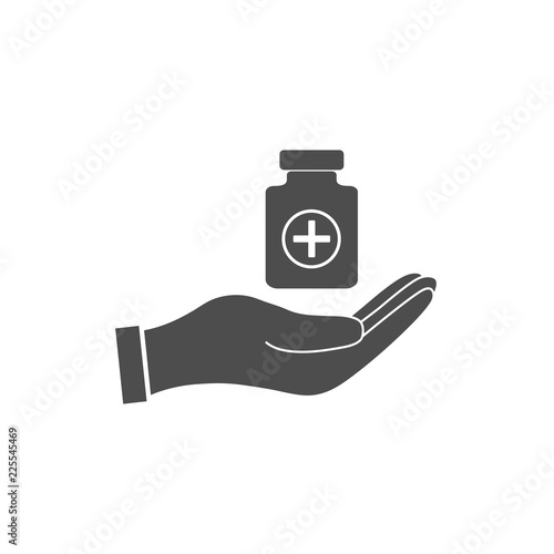 Pills in hand icon. Vector illustration, flat design.