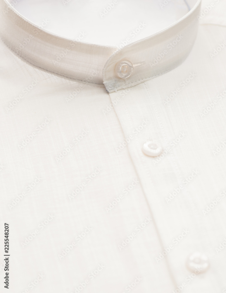 white shirt with focus on collar and button, close-up white shirt with focus on collar and button, close-up