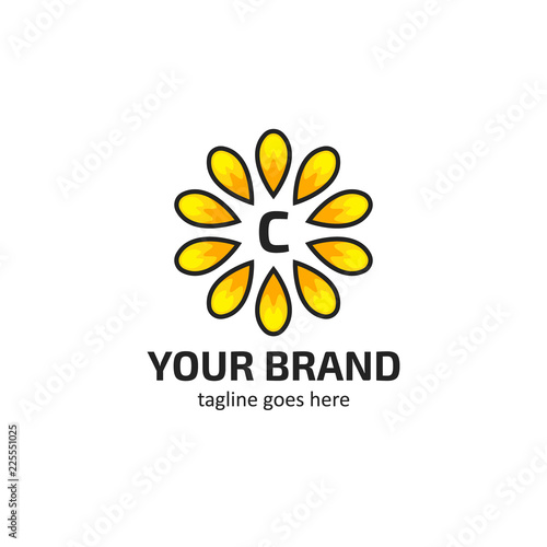 Yellow sunflower petals with letter C logo icon symbol vector