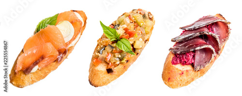 Set of various bruschettas isolated on white background, top view.