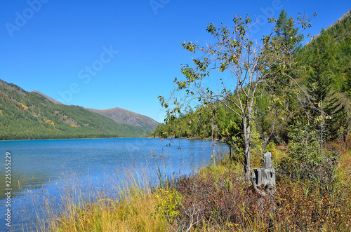 Russia, Altai territory, middle Multinskoye lake in sunny weather photo