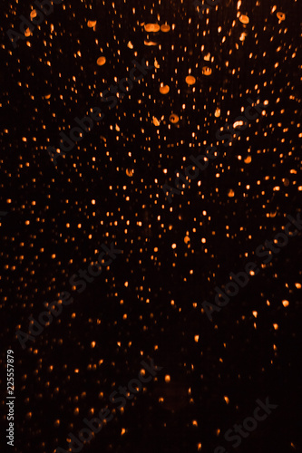 orange bokeh on dark background