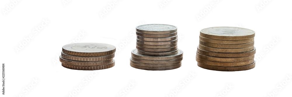 Three stacks of coins on a white background. Isolated. Three stacks of coins on a white background. Isolated.