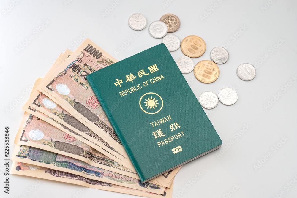 Naklejka premium Japanese yen banknotes, Japanese yen coin and ROC Taiwan passports