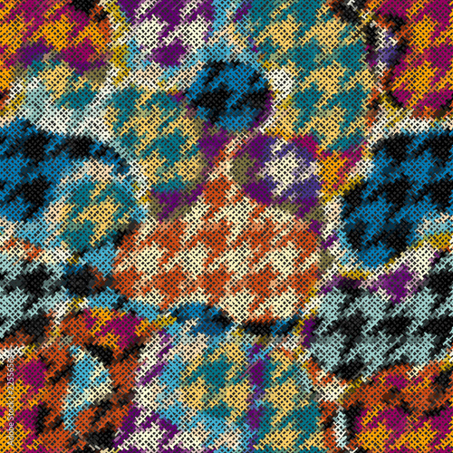 Seamless Hounds-tooth pattern. Imitation of a texture of rough canvas. Vector image.