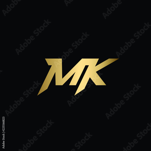 Initial Solid Letter MK Logo Design Using Letters M K in Gold and Black Color  photo