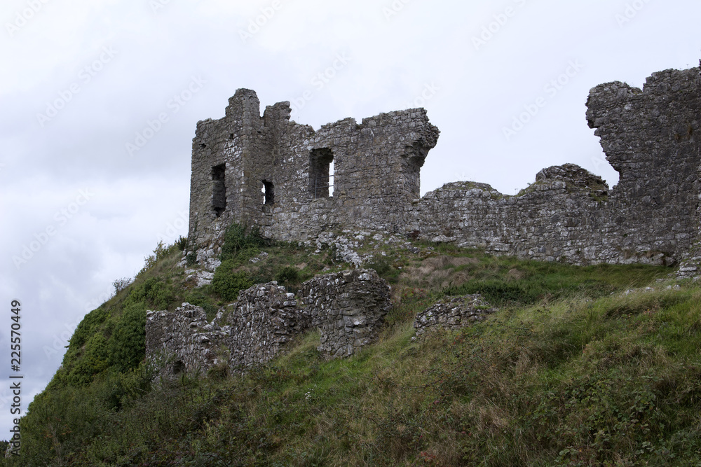 Ancient castle ruins on a bluff in rural Laois County, Ireland