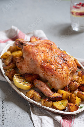 Whole roasted chicken with potato