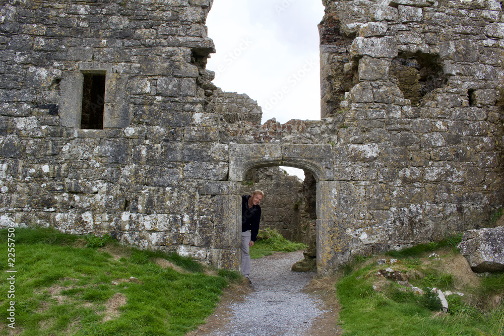 Arched stone doorway of an ancient castle ruins in County Laois, Ireland 
