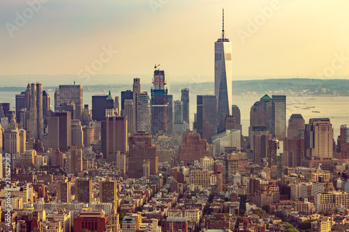 View of Manhattan from the top angle at sunset. New York City view from the top. New York City with skyscrapers at sunset. Skyline of Manhattan in New York City, United States. Aerial view of New York