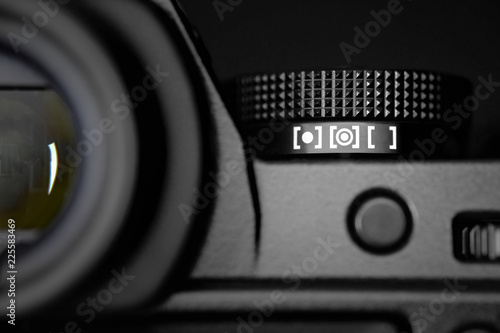 Photography Metering dial of a digital camera in black background.