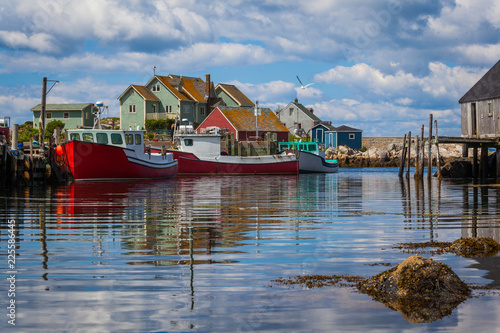 Fototapeta Summer view of fishermen houses and harbor at Peggy's Cove, Nova Scotia, Canada