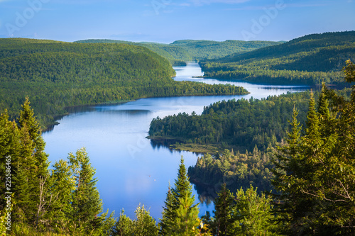 The beautiful Wapizagonke Lake at sunset viewed from the lookout Le Passage, La Mauricie National Park, Quebec, Canada photo