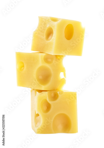 Cheese cube slices isolated on a white background