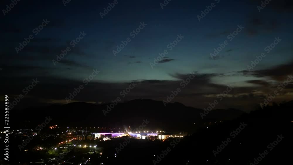 moving colorful spotlight on building and blur defocus light background in the dark night moving colorful spotlight on building and blur defocus light background in the dark night