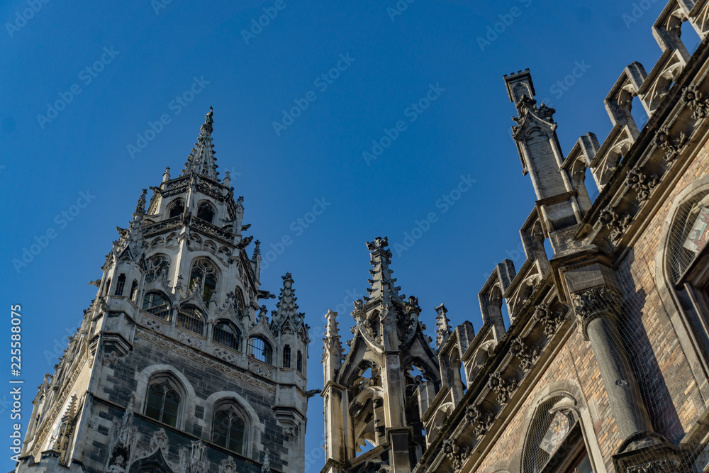 The clock tower of the new City Hall (Rathaus) in Marienplatz is a famous building in Gothic architecture - Munich, Bavaria, Germany, Europe