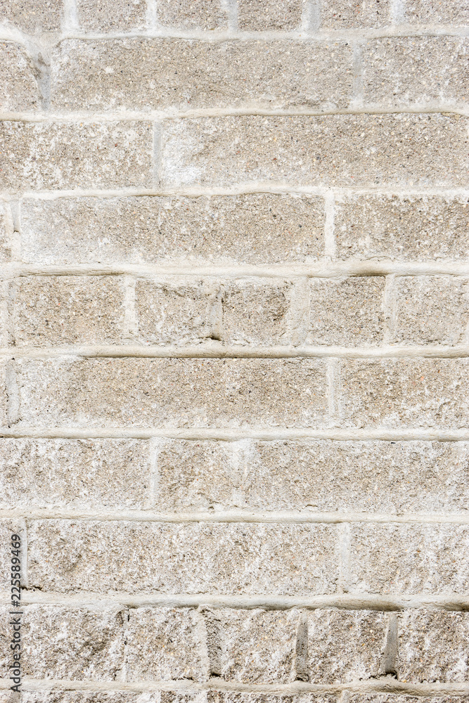 aged weathered block wall. old brick textured background closeup aged weathered block wall. old brick textured background closeup
