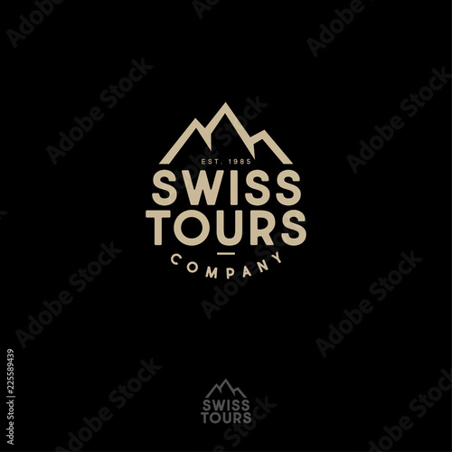 Mountains peaks and letters. Swiss Tours Company logo. Gold emblem for alpinism, ski resort or mountain tourism.
