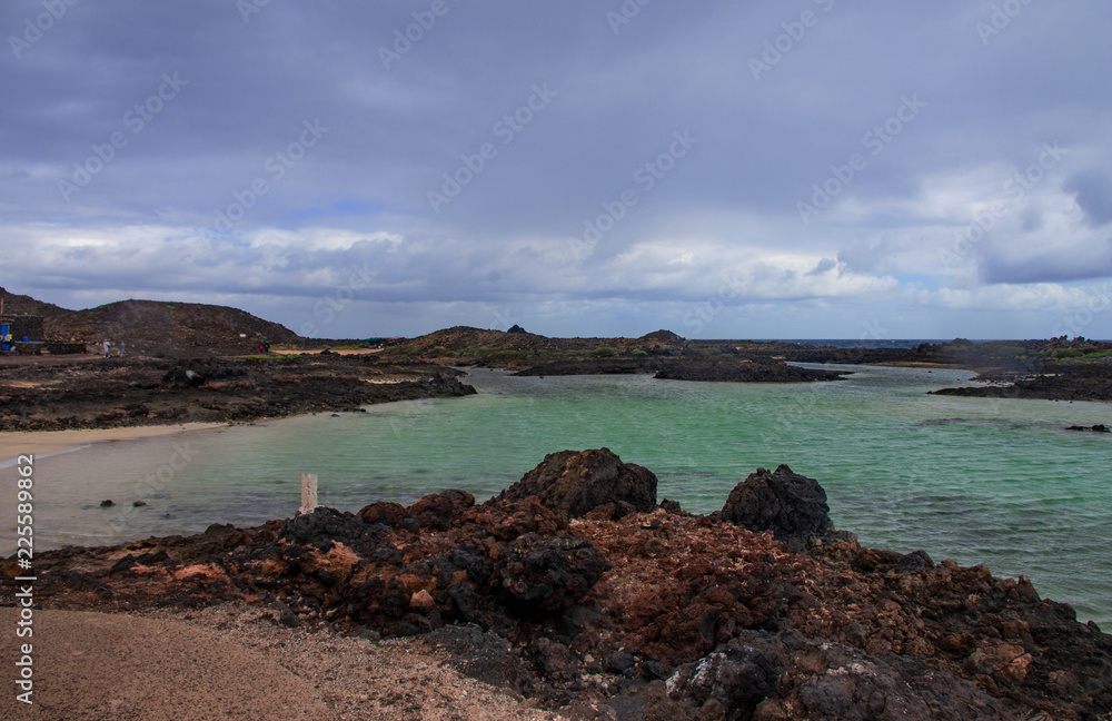 Volcanic beach with crystal clear water in Fuerteventura. Spain