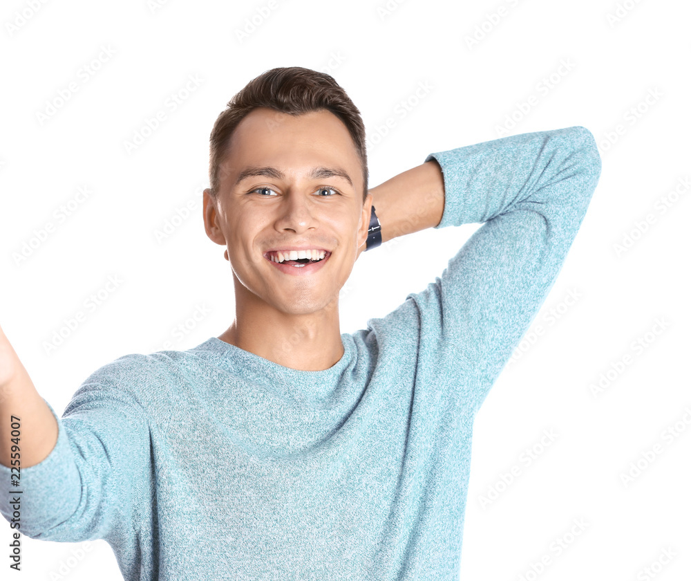 Laughing man taking selfie on white background Laughing man taking selfie on white background