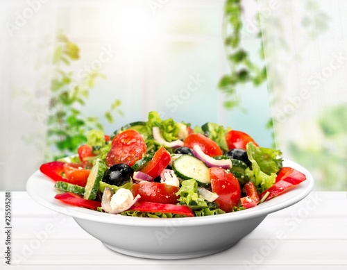 Close-up photo of fresh salad with vegetables