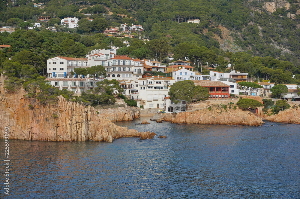 Rocky coast with the seaside village Fornells de Mar in the Aiguablava bay, Spain, Costa Brava, Mediterranean sea, Catalonia, Girona, Baix Emporda