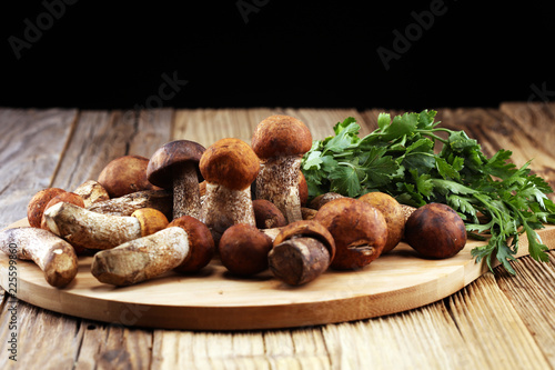 raw mushrooms on wooden table. organic fresh mushrooms