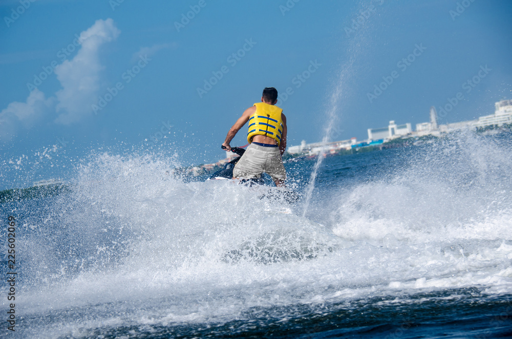 Man on a waverunner on the caribbean sea