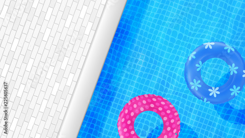 Swimming pool top view. Water background. Swim rings. Trendy. Inflatable rubber toy. Realistic summertime illustration. Summer vacation. Trip. Resort. Hotel. Top view swimming circles.