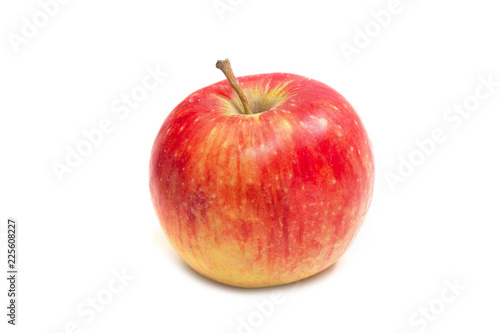 Red apple on a white background. Side view. Close-up