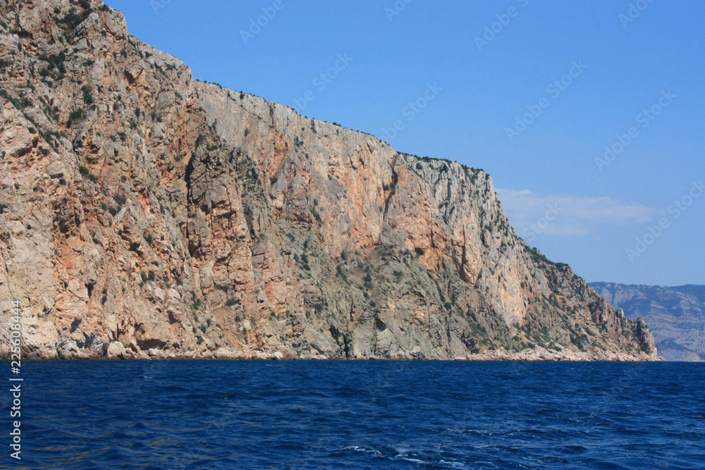 Fototapeta premium Sea waves, surf. Rocks and rocks. Black Sea. Summer. Side view