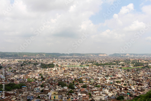Fototapeta Naklejka Na Ścianę i Meble -  The crowded Jaipur city as seen from Nahargarh Fort on the hill.