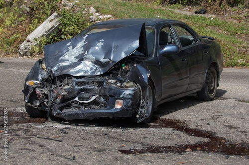 Badly damaged motor vehicle as a resuslt of a collision