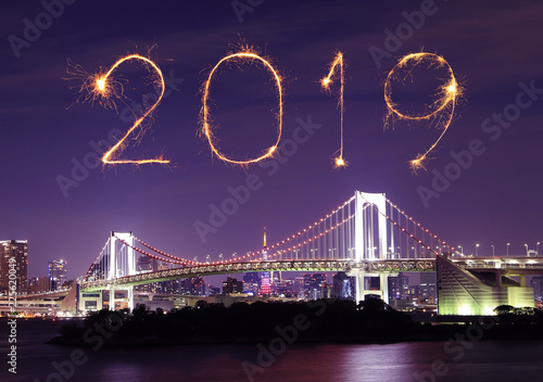 2019 Happy new year firework Sparkle with Rainbow bridge at night, tokyo, Japan