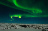 Aurora, northern lights, night, tundra in winter.