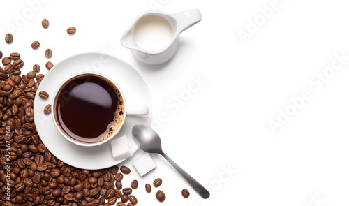 Roasted coffee beans and cup of black coffee