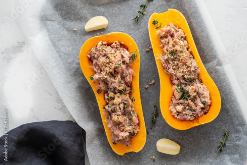 Pumpkin with minced meat with thyme, garlic. Healthy seasonal autumn cuisine. Copy space.
