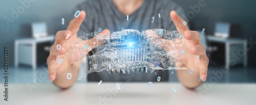 Businessman using wireframe holographic 3D digital projection of an engine