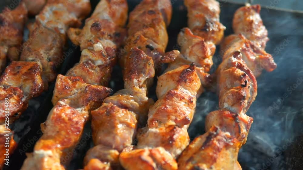 Barbecue With Delicious Grilled Meat On Grill. Barbecue Party. Chicken meat pieces being fried on a charcoal grill . Barbecue With Delicious Grilled Meat On Grill. Barbecue Party. Chicken meat pieces being fried on a charcoal grill .