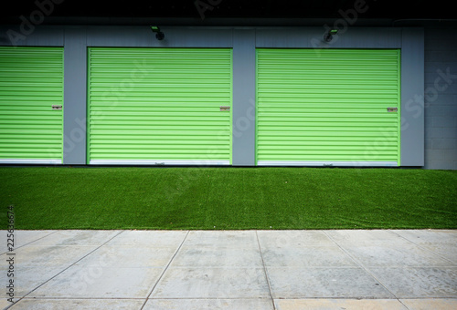 roll up green doors on modern building