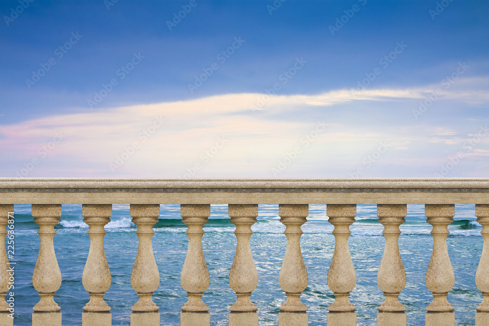 Concrete italian balustrade against a calm sea in a sunny day - concept image with copy space