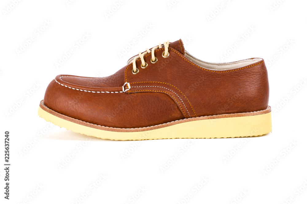 Men's brown shoes isolated on a white background.