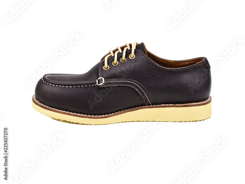 Men's dark brown shoes isolated on a white background.