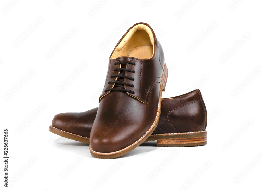 Men's brown shoes isolated on a white background. 