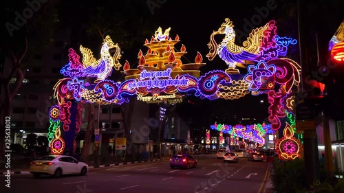 Colorful Diwali lights decoration at the start of Serangoon road of the Little India district in Singapore at night in 4K photo