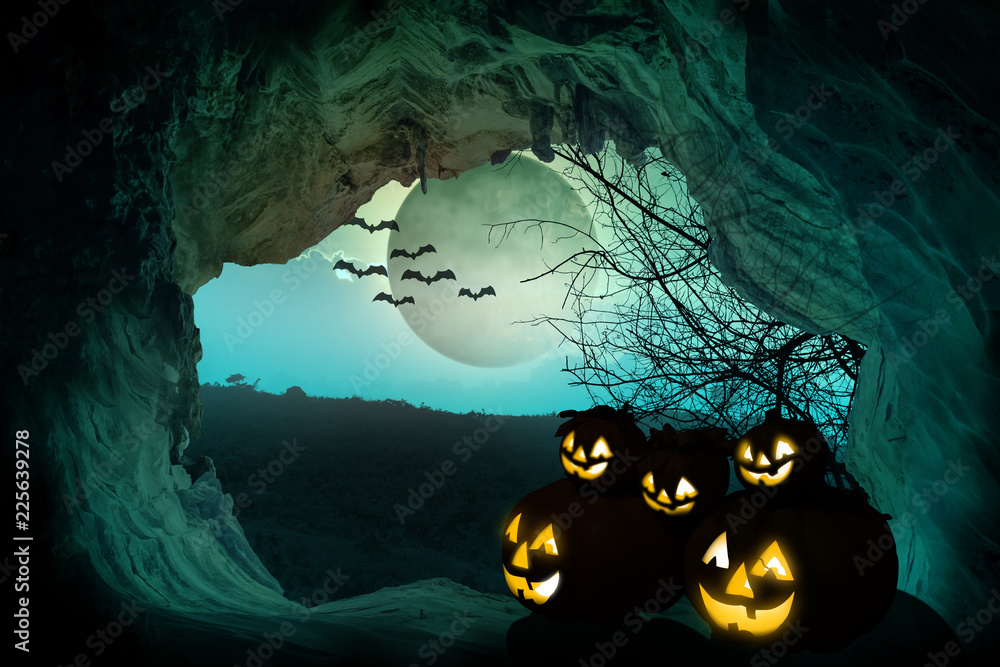 Naklejka Halloween background. Spooky pumpkin with moon and dead trees on dark forest. Halloween design concept with copy space.