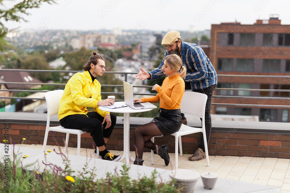 Office coffee break, people group conversation, open space on roof.