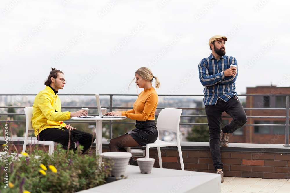 Office coffee break, people group conversation, open space on roof.